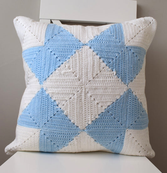 just cushions hand crochet cushion geometric star design in pale blue and white handmade in the uk