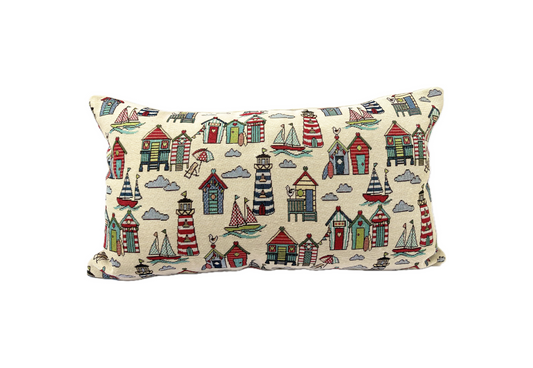 just cushions tapestry cushion seaside themed lighthouses boats beach huts on cream background woven fabric oblong uk made